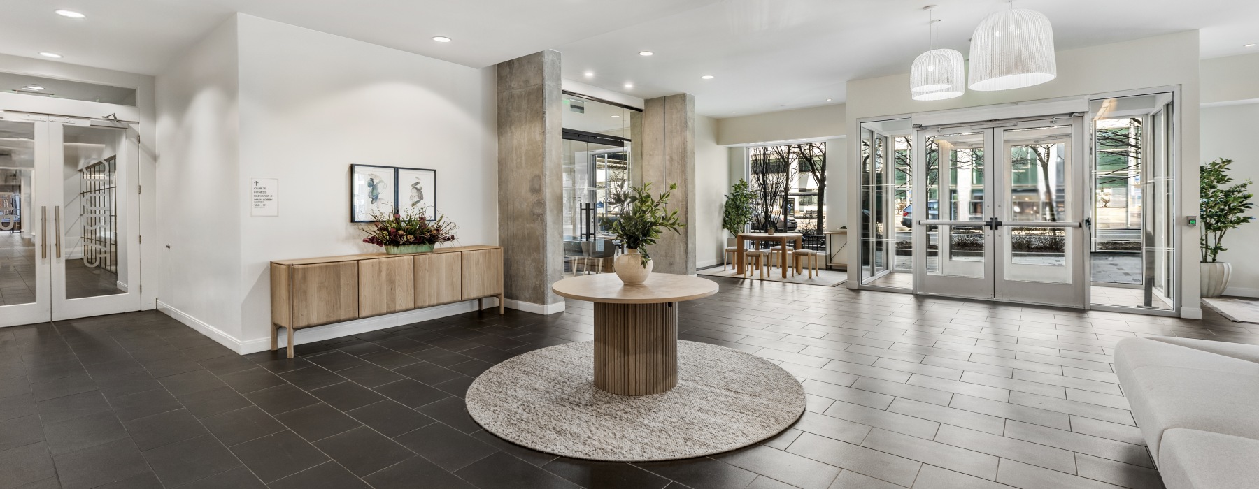 Modern resident lobby and concierge desk at 75 Tresser apartments in Stamford, CT.